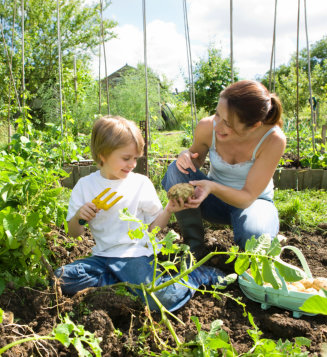 Mother and son gardening