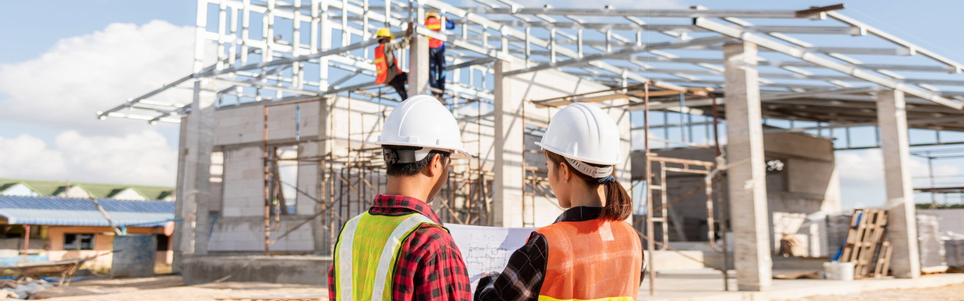 Silhouette of Engineer and worker on building site