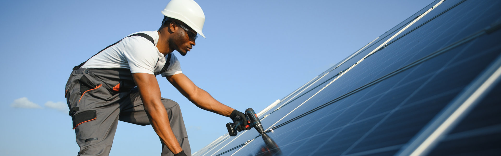 engineer maintaining solar cell panels.