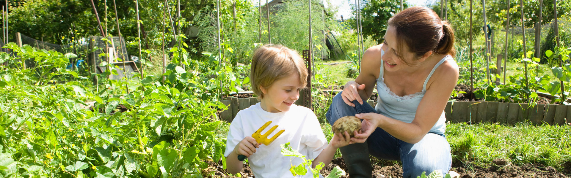 Mother and son gardening